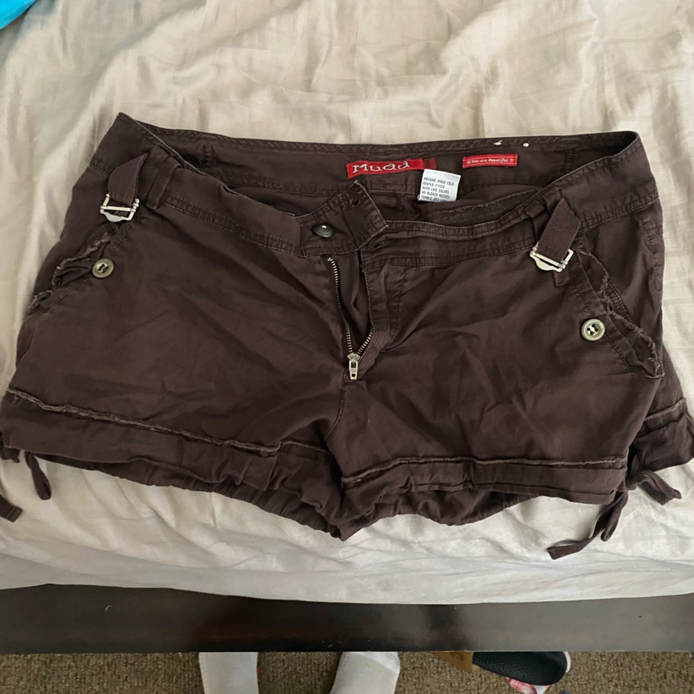 Y2k brown short shorts, shaggy, and low rise
